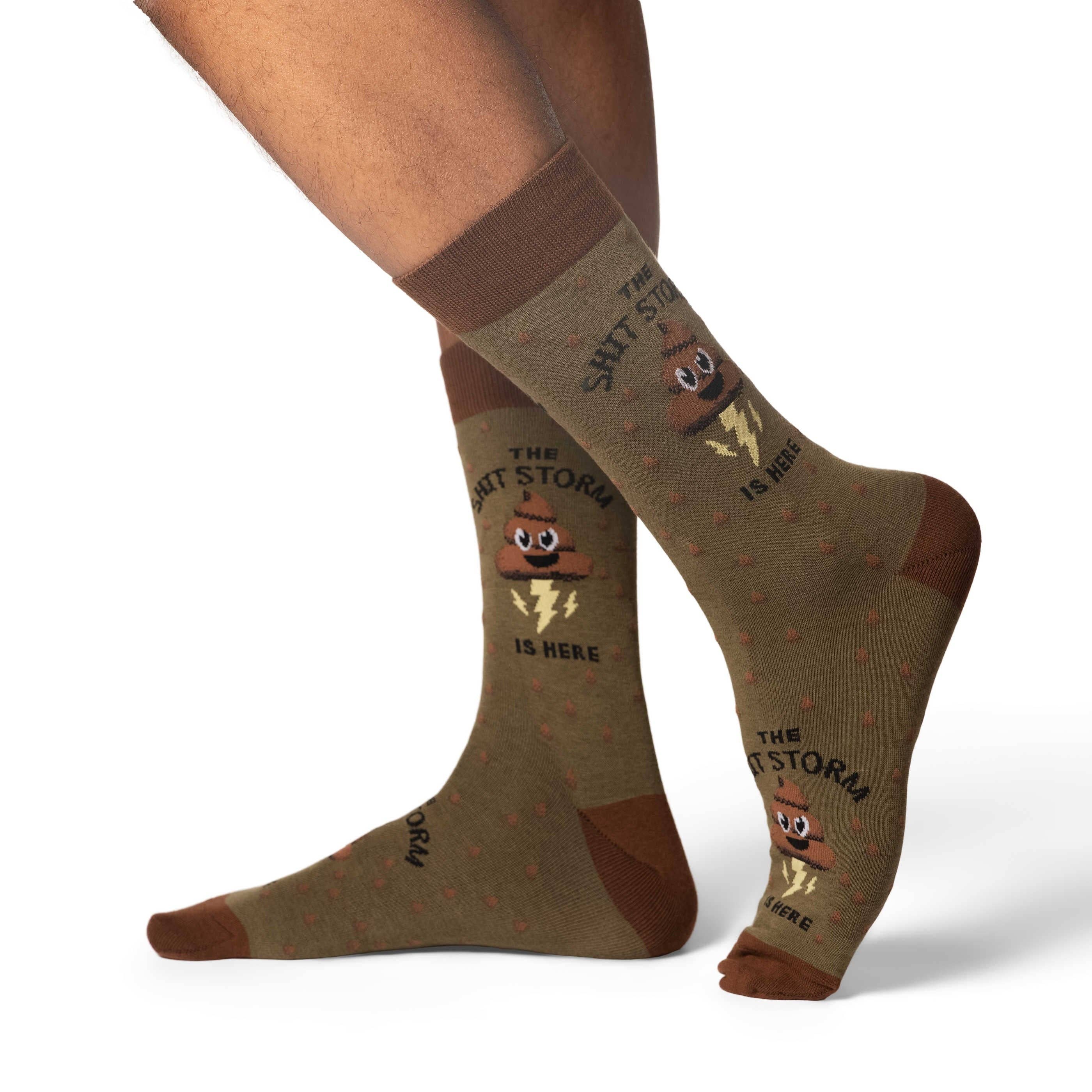 Image of Brown socks with cartoon character and text on a white background
