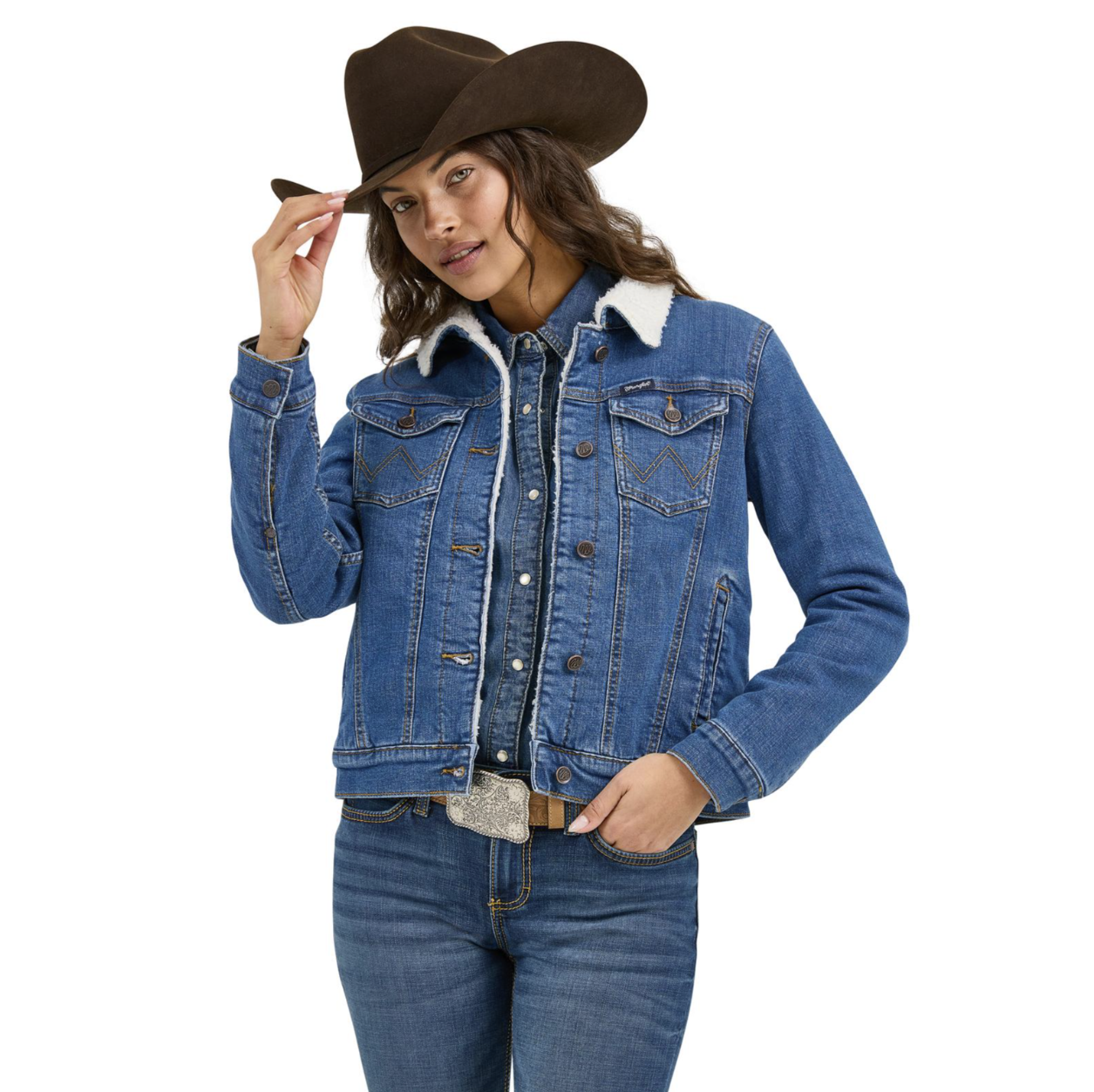 Image of Woman wearing a blue denim jacket and brown cowboy hat on a white background