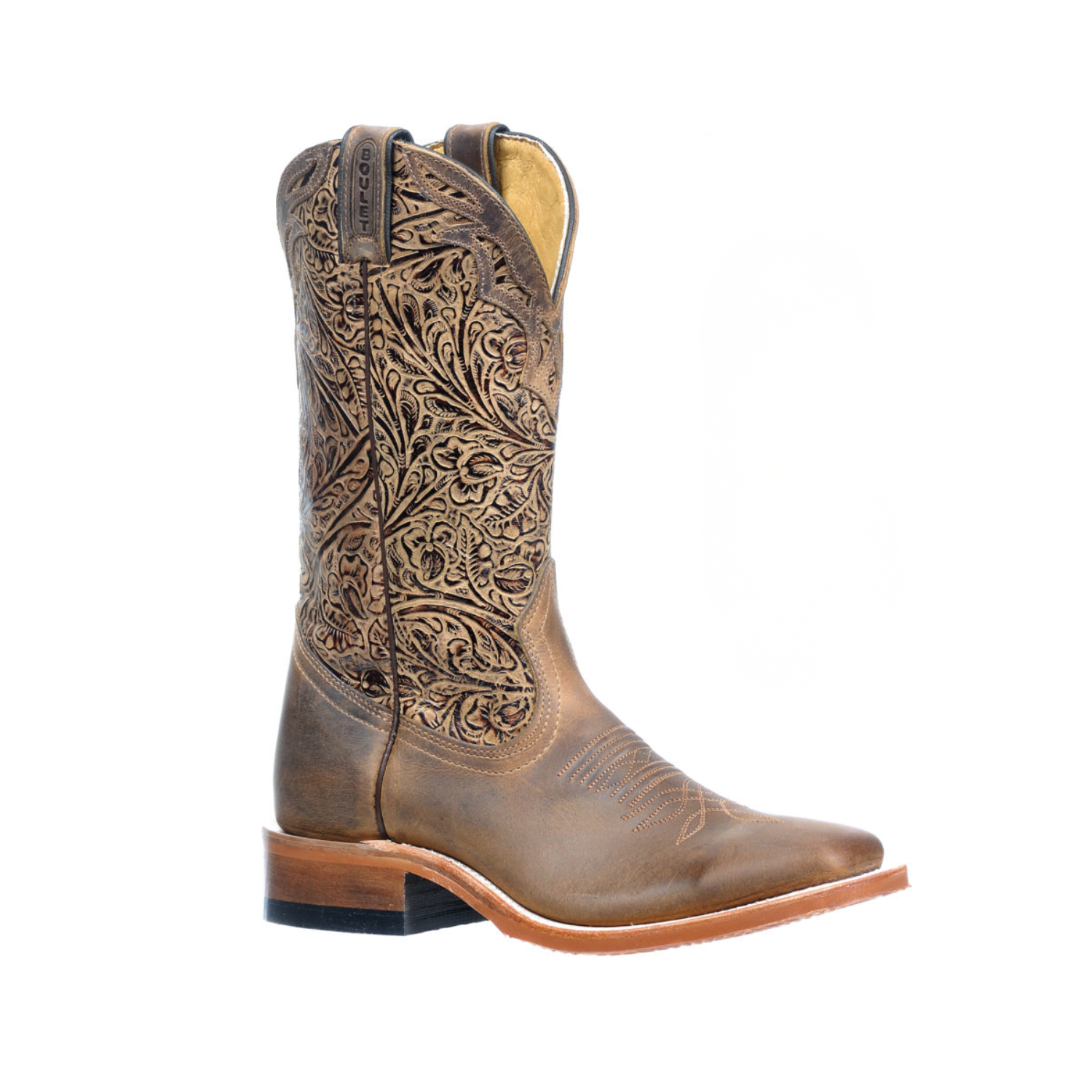 Image of Brown cowboy boot with intricate embossing on a white background