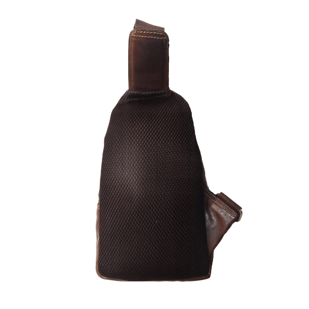 Image of Brown leather sling bag on a white background