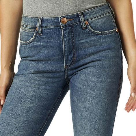 Image of Blue jeans worn by a person on a white background