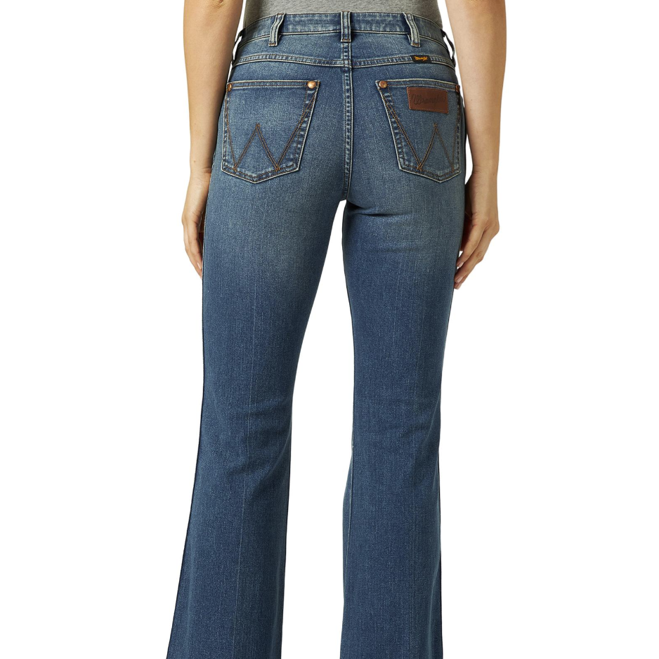 Image of Blue jeans worn by a person on a white background