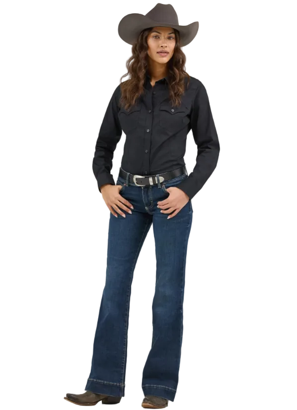 Image of Woman wearing a black shirt, blue jeans, and a cowboy hat on a white background