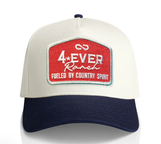 Image of Beige and navy cap with a red and white patch on a white background
