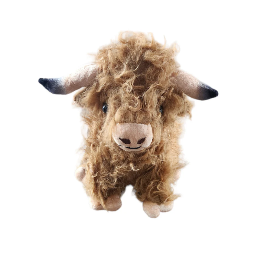 Image of Plush toy of a highland cow on a white background