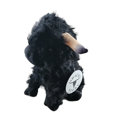 Image of Black plush toy with a visible brand logo on a white background