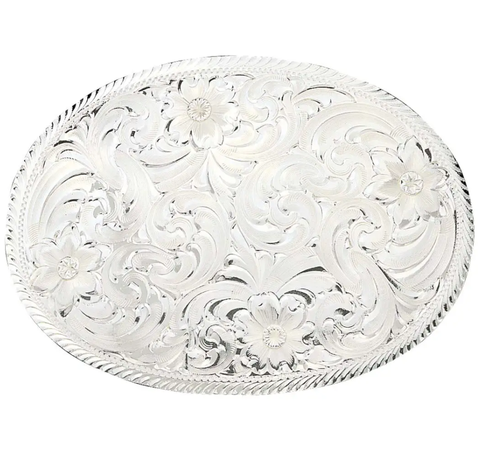 Image of An oval silver tray with intricate floral and scroll engraving, featuring a twisted rope-style rim, shown against a plain white background.