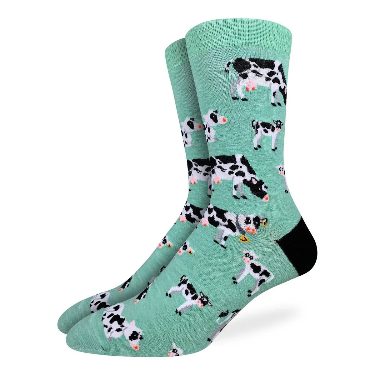 Image of Men’s mint green crew socks with an all over cow print for a playful and lighthearted everyday style.