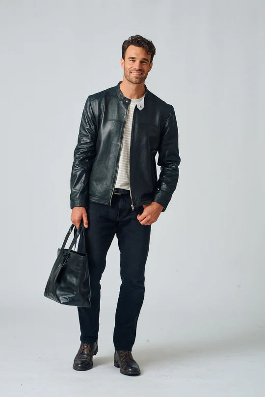 Image of Man wearing a black leather jacket and holding a black bag on a white background