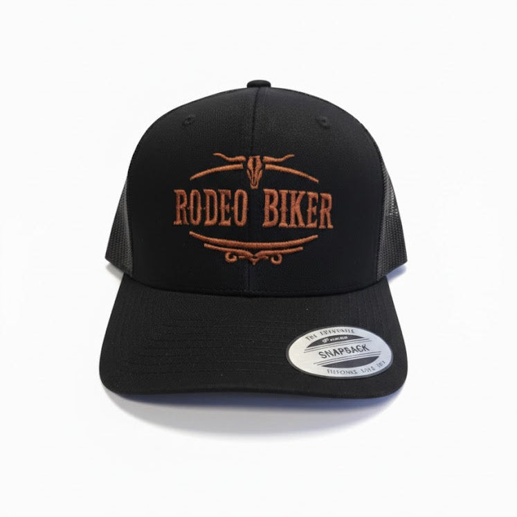 Image of Black cap with 'Rodeo Biker' text on a white background