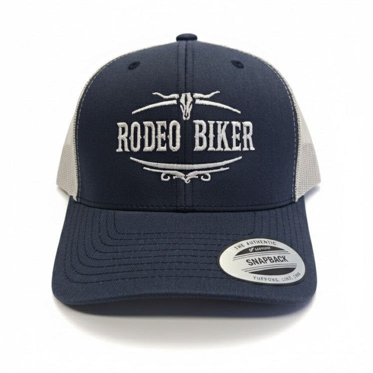 Image of Navy and beige cap with 'Rodeo Biker' text on a white background
