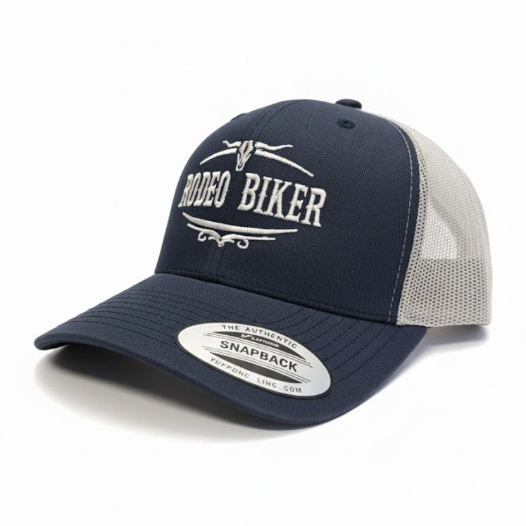 Image of Navy blue and gray cap with 'Rodeo Biker' text on a white background