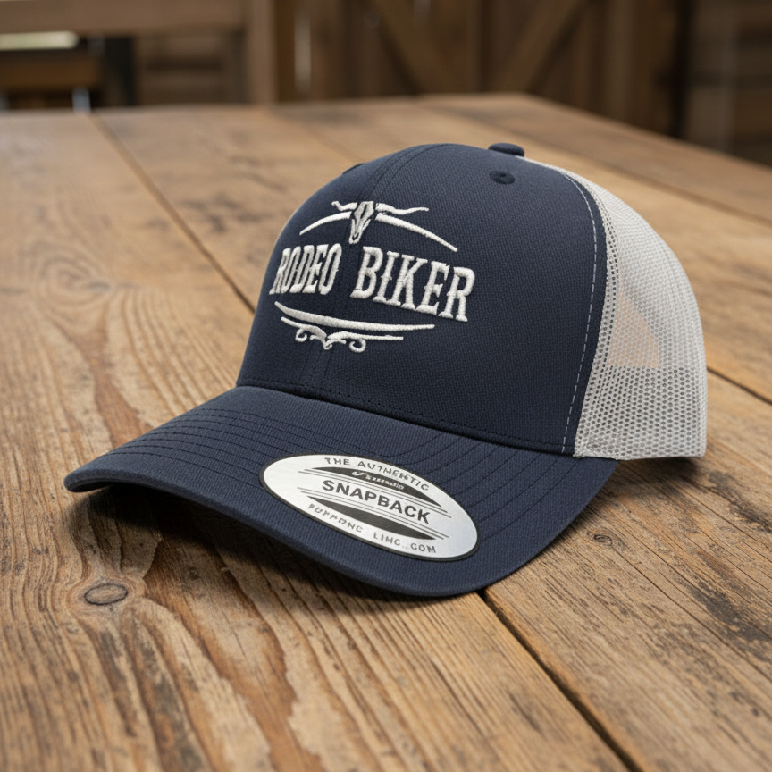Image of Navy and beige cap with 'Rodeo Biker' logo on a white background