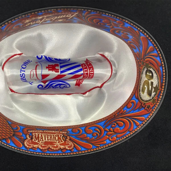 Image of Decorative cowboy hat with intricate designs and a visible brand logo on a black background