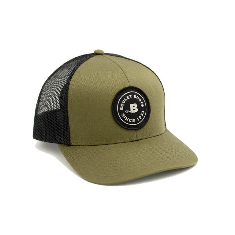 Image of Green and black cap with a logo on a white background