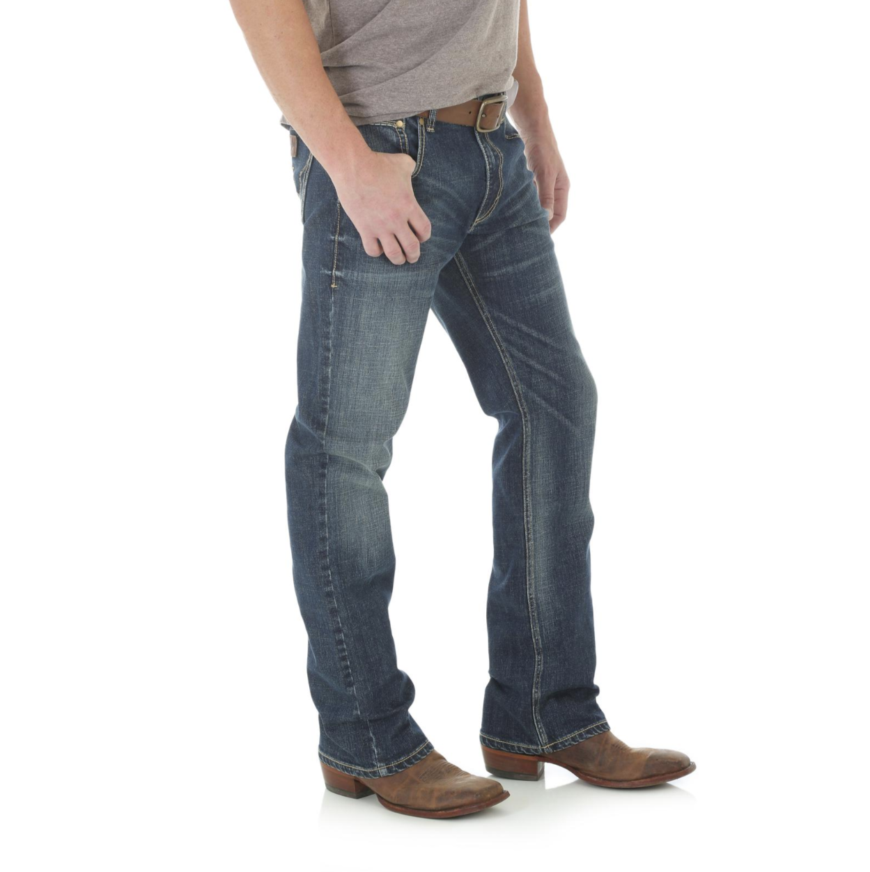 Image of Person wearing blue jeans and brown boots on a white background
